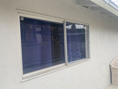 old aluminum window before